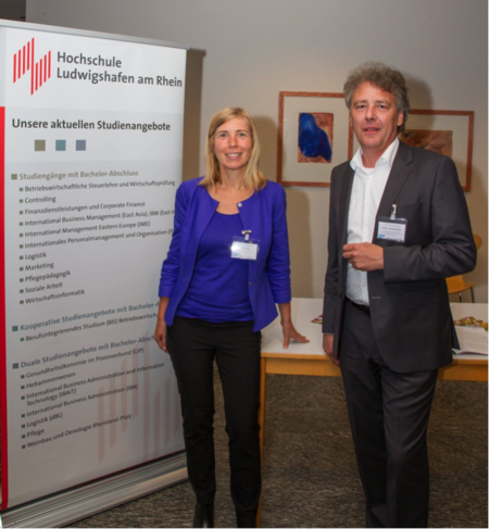 Prof. Dr. Raab and Kathrin Paul at the booth of the University of Applied Sciences Ludwigshafen, course of studies: "International Business Administration and Information Technology (IBAIT)" (B. Sc.)