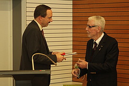 The ceremonial presentation of the university medal from the president of the university Prof. Peter Mudra to Prof. Bill Murray