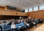 First semester welcome: view of the packed auditorium