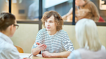 Job interview with a young applicant and two recruiters