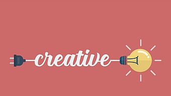 Vektorgrafik mit Glüchbirne und "creative"-Schriftzug