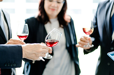 mba wine group with red wine glasses