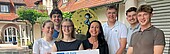 Students with donation check