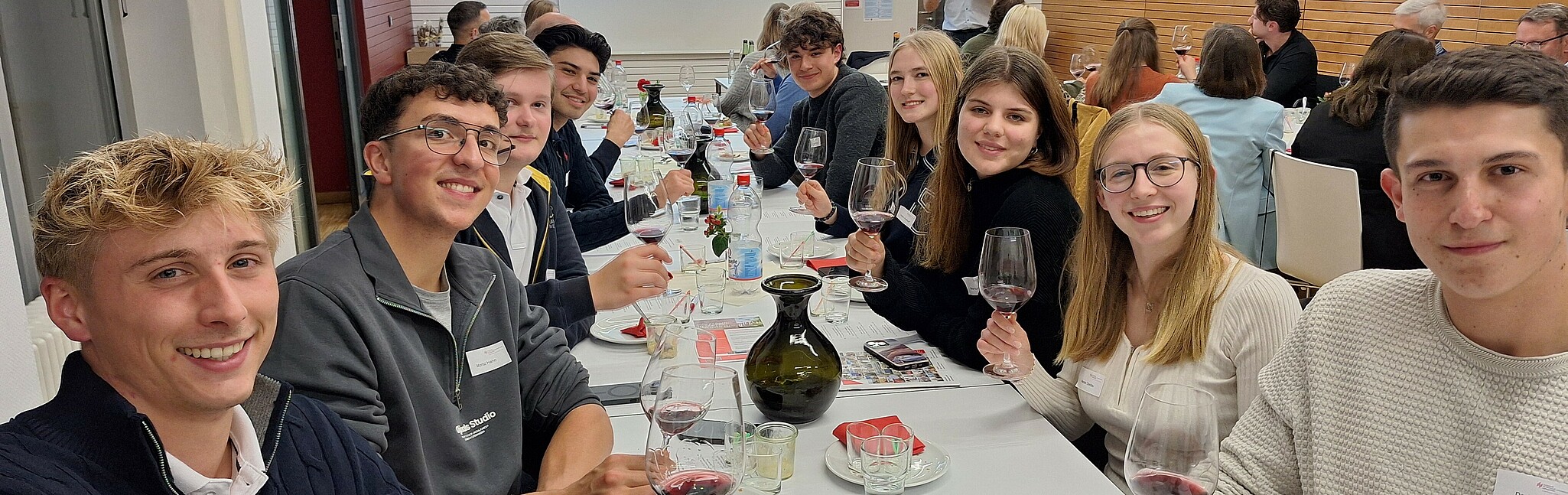 Students at the alumni wine tasting