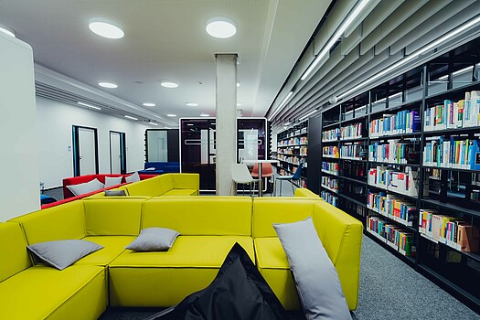 Yellow seating area in the library