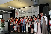 Group of graduates with certificates