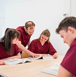 Four students working in a group.